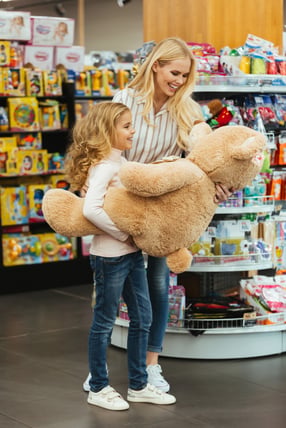delighted-mother-daughter-with-toy